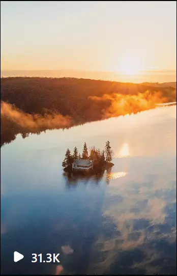 a small island in the middle of a lake in Gatineau Park, Quebec