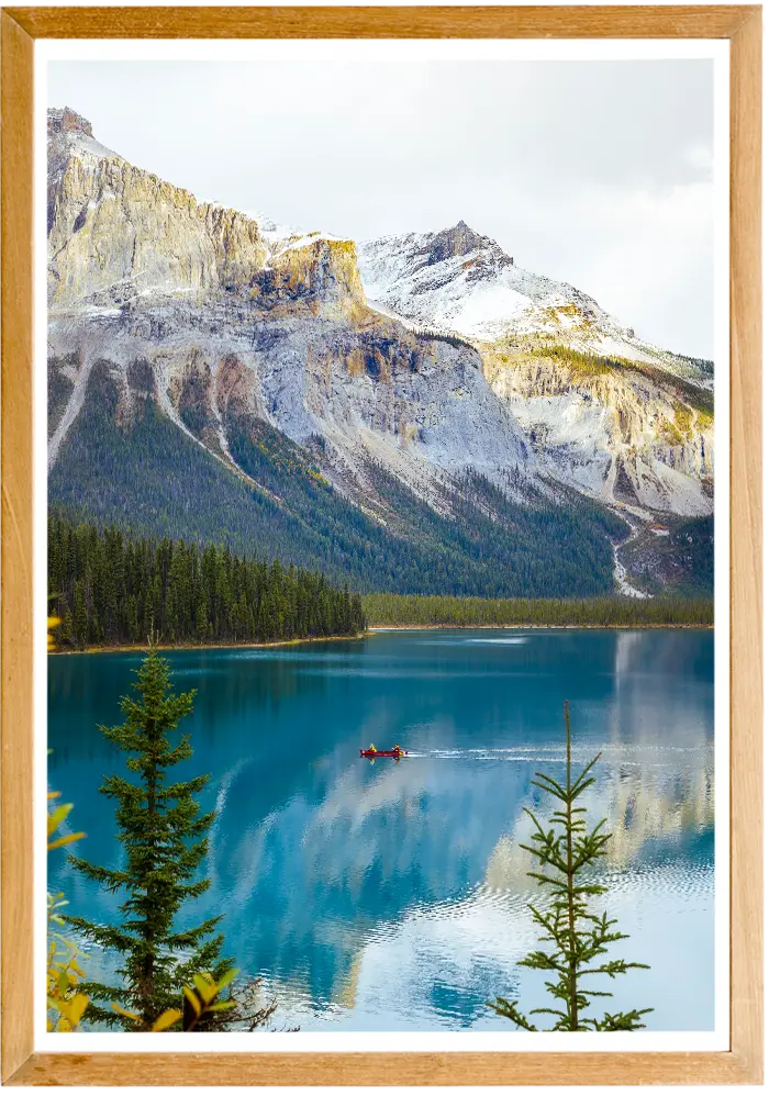 Framed picture of Emerald lake with a red canoe