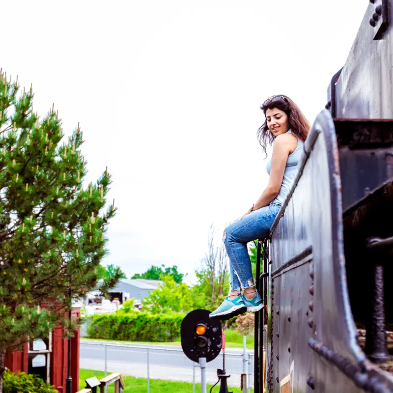 Girl sitting on a train